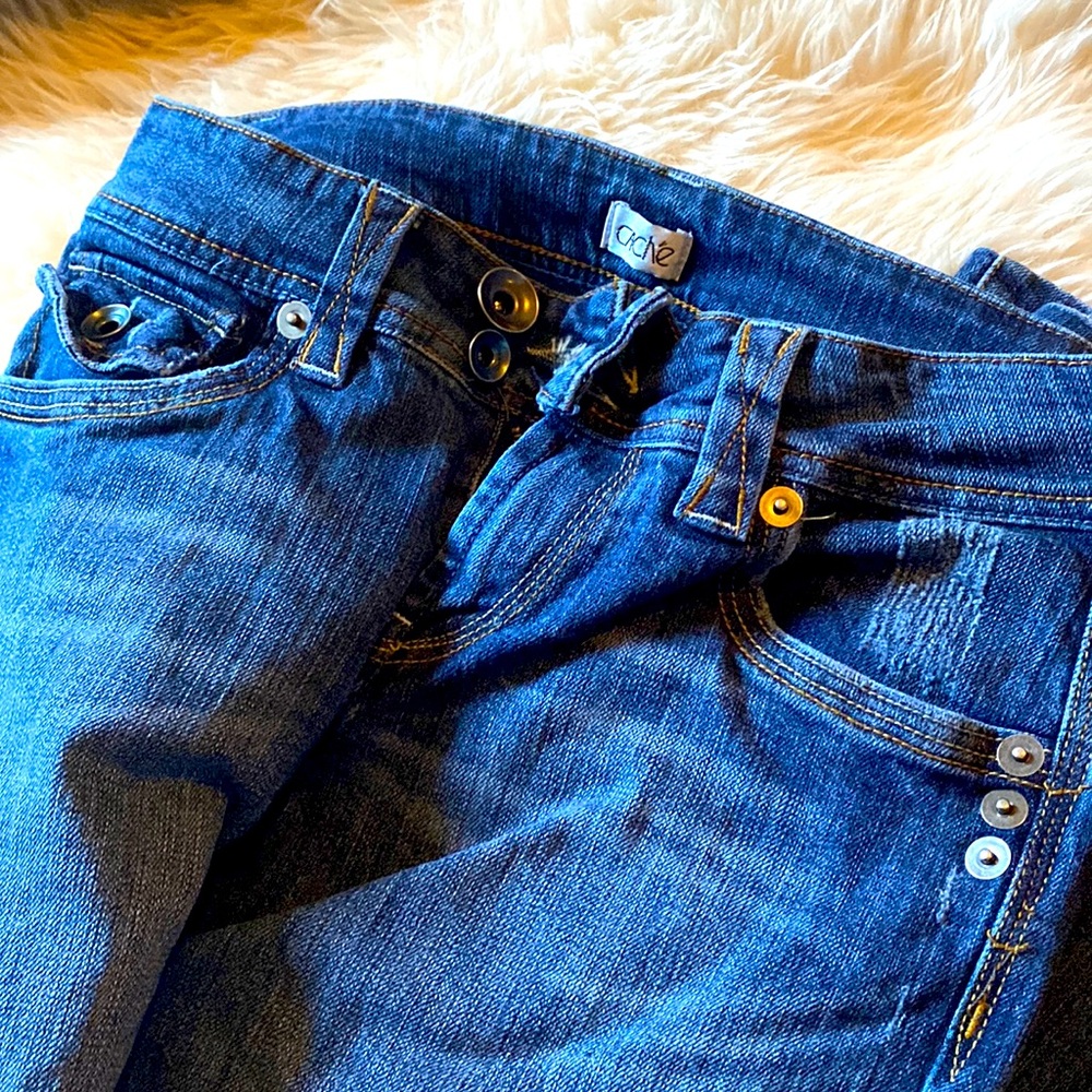 Ladies cache jeans With flare leg size 2